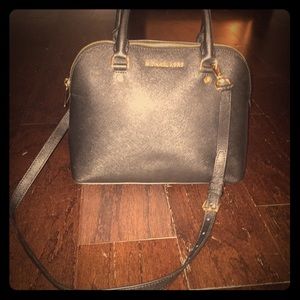 Medium sized, black Michaels Kors purse